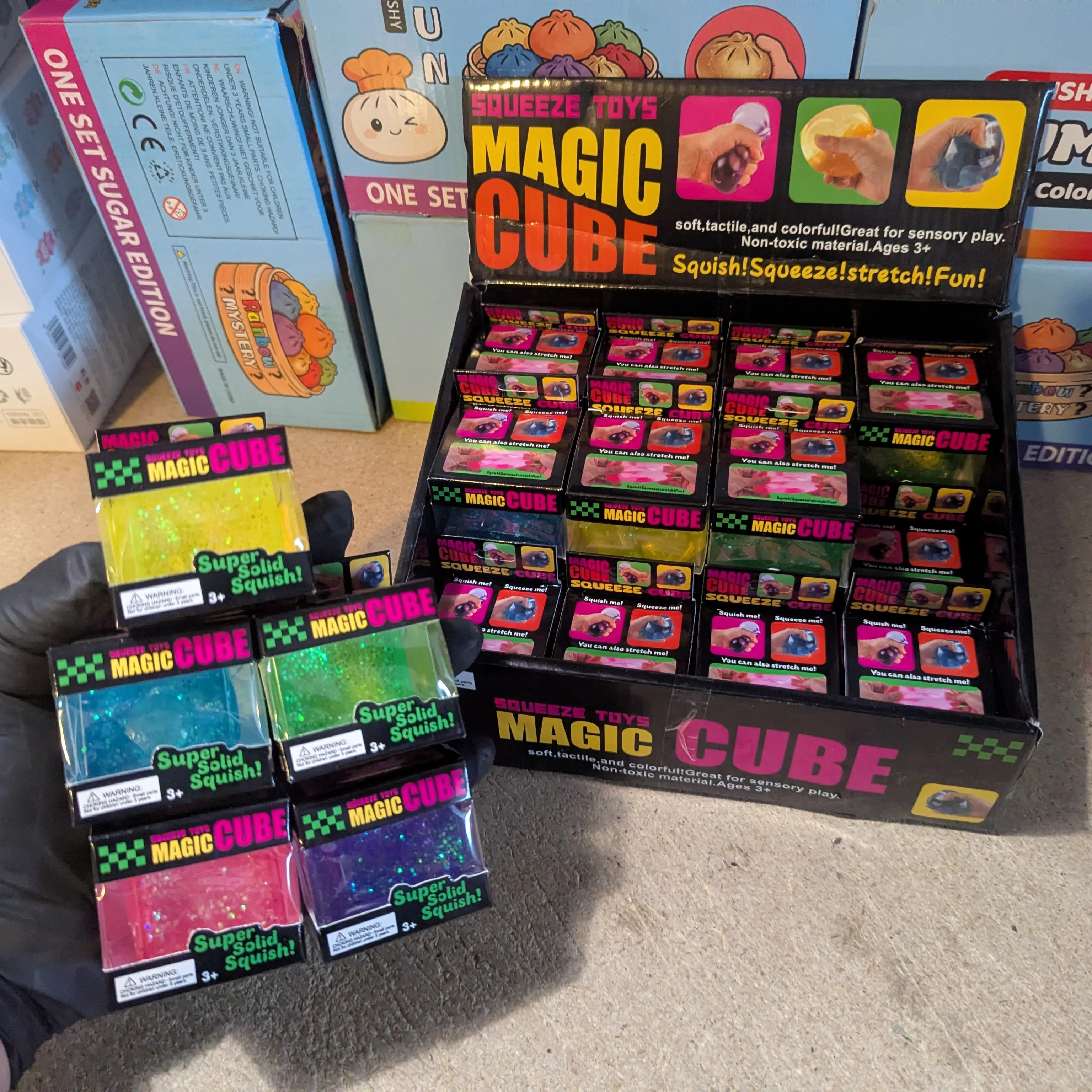 Set of Five Translucent Glitter Mini Magic Cube by Squeeze Toys (Slow-Rising Squish) - Image 2